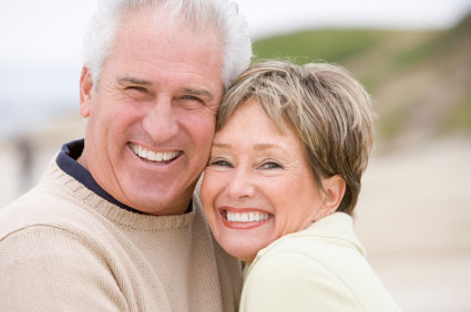 Mature couple posing and smiling