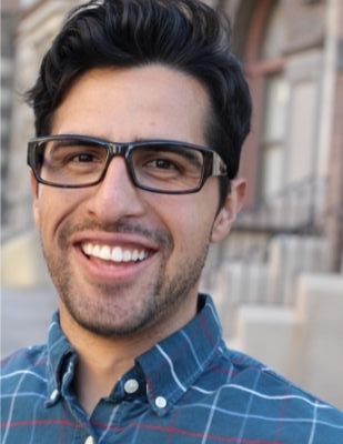 Man with glasses smiling for info on whitening a gray tooth - from Tulsa, OK dentist Dr. Jerome Cha