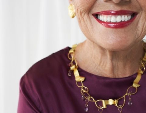 A senior woman's smile - for info on a denture reline kit